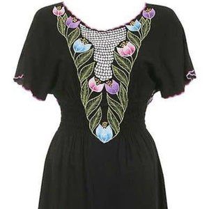 Embroidered Butterfly design Figure flattering shape